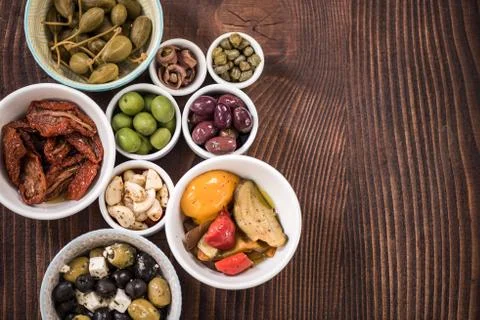 Selection of tapas in ceramic bowls Stock Photos