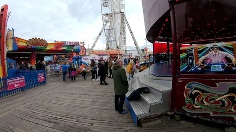 Selection of various rides on pier, big wheel, waltzers and more Stockbeeldmateriaal 122285833