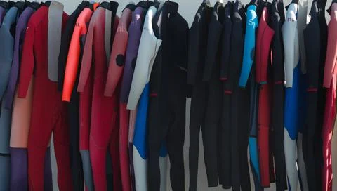 Selection of wetsuits Stock Photos