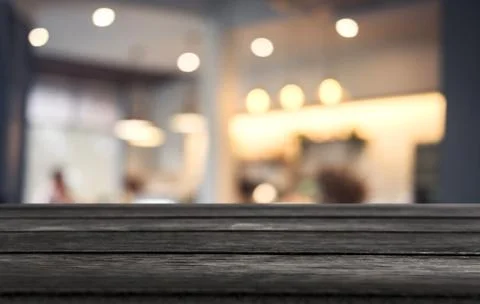Selective Empty wooden table and blurred background of abstract in front of c Stock Photos