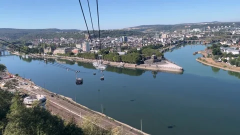 Selective focus aerial cable car ride above Rhine and Moselle rivers in Koble Stock Footage 344931653
