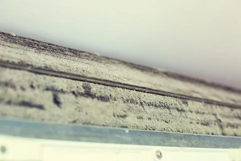 Selective focus to air conditioner filter with a lot of dust. Stockfoto's