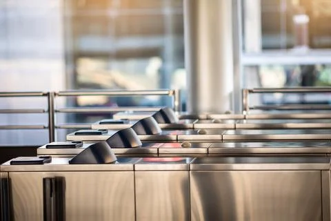 Selective focus to automatic gate machine at sky train station. Modern auto.. Stock Photos