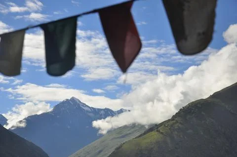 Selective focus of beautiful view of mountains covered with clouds  Stock Photos