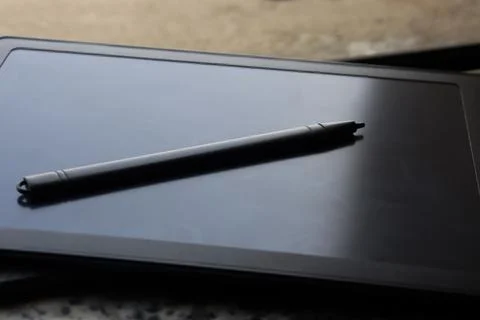 Selective Focus on Black color Tablet with pen .Black screen tablet with pen Stock Photos