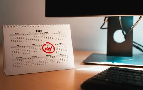 Selective focus on a blank calendar sheet with the month of july marked as Stock Photos