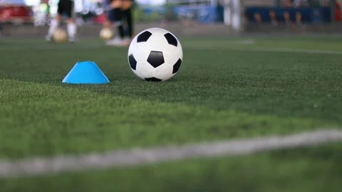 Selective focus to blue marker cone and soccer ball. Stock Footage 144760232