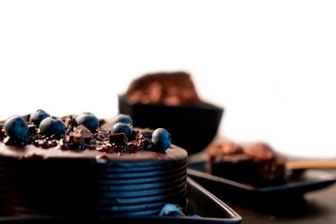 Selective focus on Blueberry paste on the cake. Stock Photos