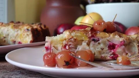 Selective focus, Blurred background, close-up. A slice of Apple pie and a jam Stock Photos