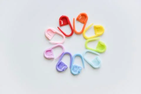 Selective focus with blurry effect at colored safety pins Stock Photos