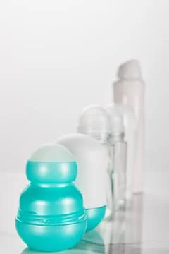 Selective focus bottles deodorant isolated Stock Photos