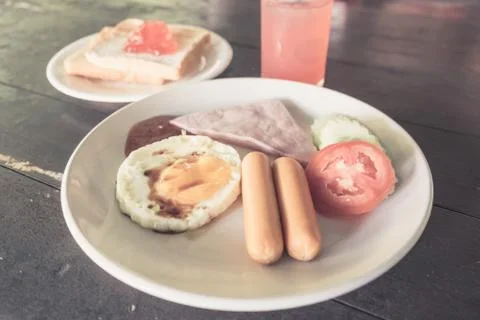 Selective focus on breakfast dish in vintgae tone Foto stock