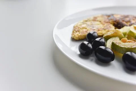 Selective focus at the breakfast on the white plate Stock Photos