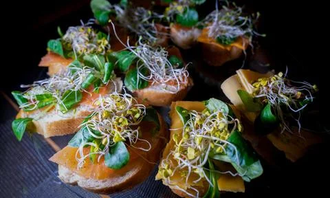 Selective focus of bunch of Wholegrain bread sandwiches with smoked salmon, s Stock Photos