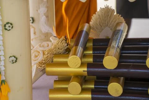 Selective focus Burning Artificial flowers from paper Fotos Stock