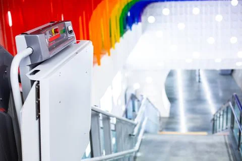 Selective focus to button switch panel of electric stairs for transporting di Stock Photos