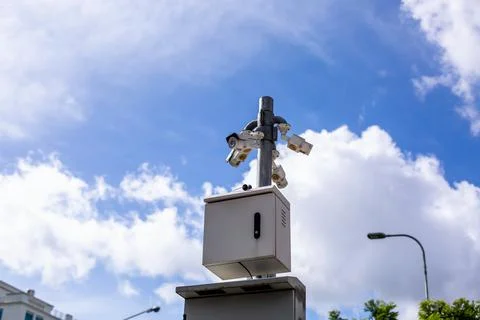 Selective focus to CCTV Camera with blue sky Stock Photos
