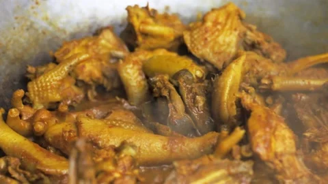 Selective focus of chicken curry or rendang in the making, a popular tradit.. Stock Footage 231740730