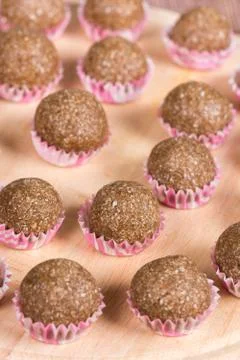 Selective focus on chocolate cupcake with coconut with shallow f Stock Photos
