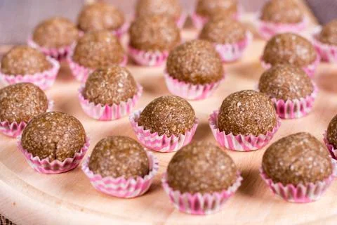 Selective focus on chocolate cupcake with coconut with shallow f Stock Photos