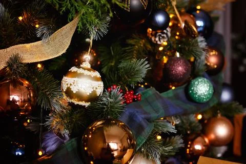 Selective focus. Christmas decorations in the form of balloons and ribbons on Stock Photos