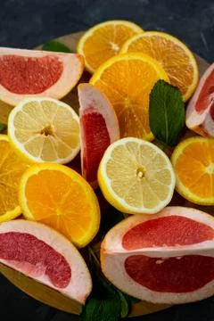 Selective focus, citrus fruit on dark background Stock Photos
