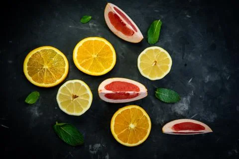 Selective focus, citrus fruit on dark background Stock Photos