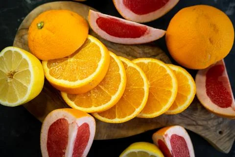 Selective focus, citrus fruit on dark background Stock Photos