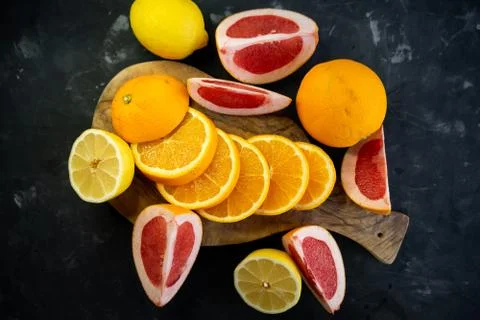 Selective focus, citrus fruit on dark background Stock Photos