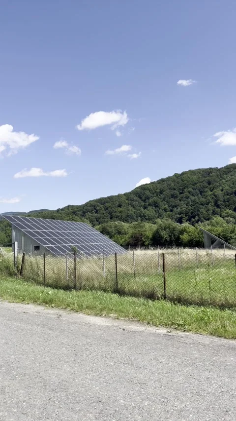Selective focus on clean energy in scenic mountain valley Stock Footage 313713575