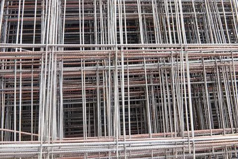 Selective focus close-up background of reinforcement wire mesh Stock Photos