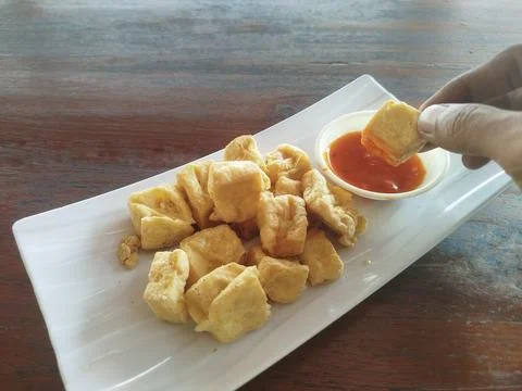 Selective focus close up crispy diced fried tofu 스톡 사진