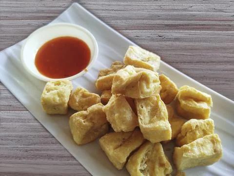 Selective focus close up crispy diced fried tofu Photos