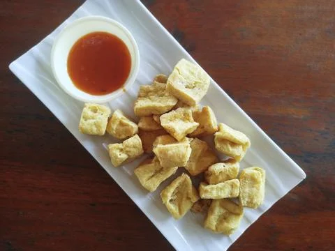 Selective focus close up crispy diced fried tofu Foto stock