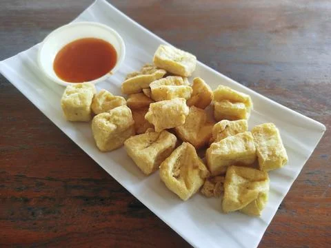 Selective focus close up crispy diced fried tofu Foto stock