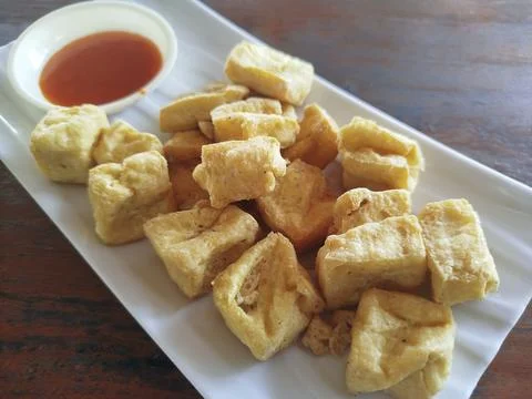 Selective focus close up crispy diced fried tofu Photos