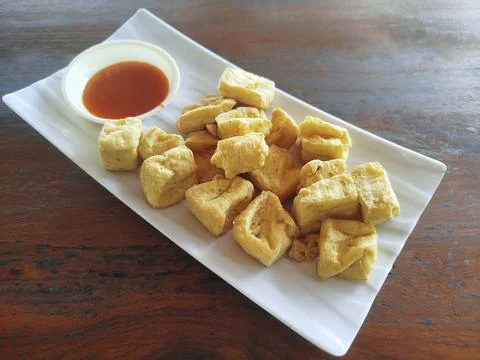 Selective focus close up crispy diced fried tofu Photos