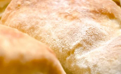 Selective focus close-up of freshly baked yeast, puff dough strudel. Pastries Stock Photos