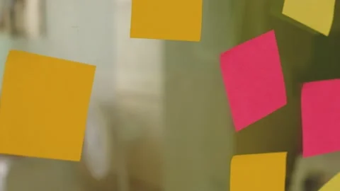 Selective focus, close up indoor shot at hand of businessman put colorful pos Video stock 146363929