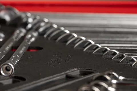 Selective focus close-up of metal wrenches in tool drawer Foto stock