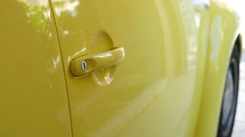 Selective focus, close up shot at men hand reaching to open door of colorful  Video stock 146363930