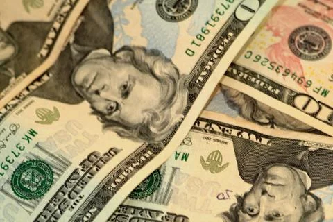 Selective focus close up of us banknotes and coins Stock Photos