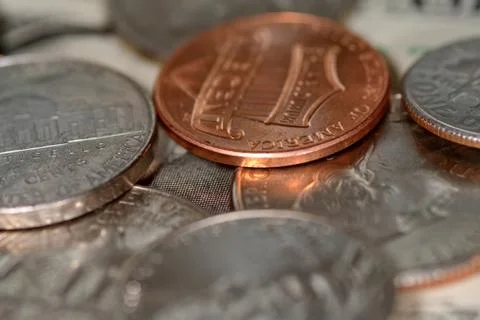 Selective focus close up of us banknotes and coins Stock Photos