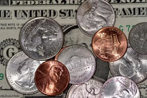 Selective focus close up of us banknotes and coins Stock Photos