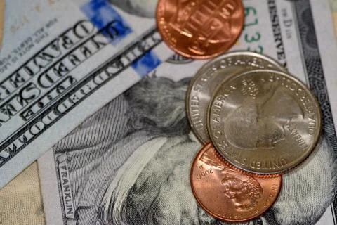 Selective focus close up of us banknotes and coins Stock Photos