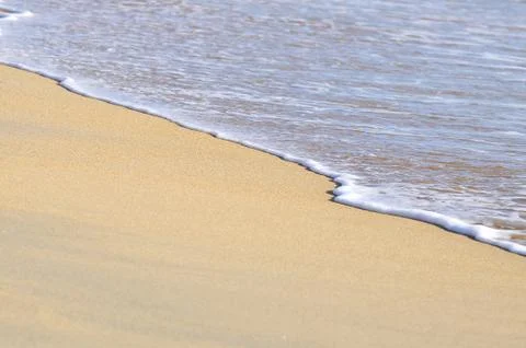 Selective focus of close up waves at the beach Foto stock