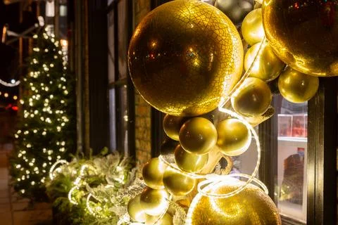 Selective focus closeup of large decorative Christmas golden balls Stock Photos