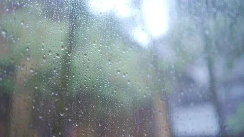 Selective focus closeup of rainy window - left side focal plane Stock Footage 157666271