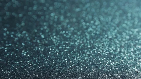 Selective focus closeup shot of black and blue glitter Stock Footage 92322581
