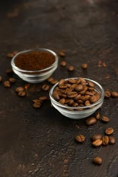 Selective focus, coffee beans and freshly ground Stock Photos